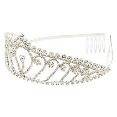 You'll look like a queen when you wear this tiara! This statement making tiara is embellished with glass rhinestones in an ornate design. Finish: Silver-tone Design Dimensions: 7.5"W Material: Metal Gender: female.  Age Group: kids. Queen Tiara, Queens Tiaras, Ornate Design, Tiara, Gender Female, Age Group, Silver Tone, Hair Accessories, Queen