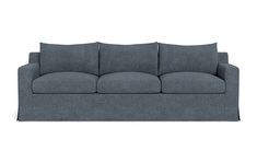 a gray couch sitting on top of a white floor