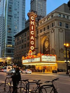 the chicago theater marquee is lit up at night