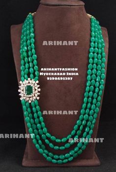 Elegant most beautiful emerald four layerd Mala with a beautiful Diamond replica brouchs Emerald Beads Jewelry Indian Pendant, Emrald Beeds Necklace Diamond, Hydrabadi Necklace, Hyderabadi Jewelry, Mangalsutra Design, Locket Design, Jewelry Pakistani, Black Beads Mangalsutra Design, Beads Collection