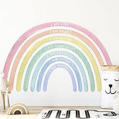 a rainbow wall decal in a child's room