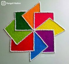 four different colors of felt are arranged in the shape of a square and rectangle