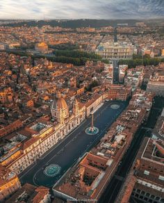 an aerial view of a city with lots of buildings