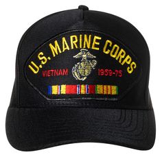 the u s marine corp hat is black and has an embroidered us marine emblem on it