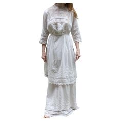 This incredible antique Edwardian two-piece dress was made in the early 19th century, and it is a stunning, museum-worthy (and museum quality) work of art. These Victorian/Edwardian era dresses are commonly mis-referred to as tea dresses or tea gowns, but they were actually known as "lingerie dresses." With this piece you are getting two pieces in one, which were meant to be worn together with the skirt layered under, but in reality can be mixed and matched countless ways, worn together or separ Edwardian Era Dress, Era Dresses, Tea Dresses, Tea Gown, Cream Lace Dress, Edwardian Dress, Lawn Dress, 1980s Dresses, Antique Dress