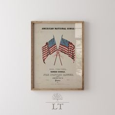 an american national service poster hangs on the wall in front of a white wall with a wooden frame