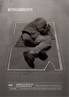 a man laying on top of a black and white poster