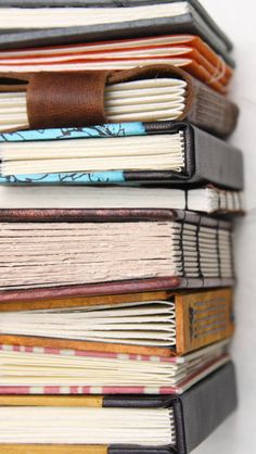 a stack of books sitting on top of each other