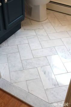 the bathroom floor is clean and ready for us to use