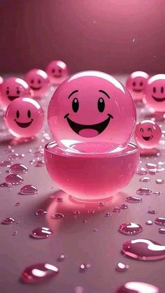 a pink bowl filled with water and smiling faces