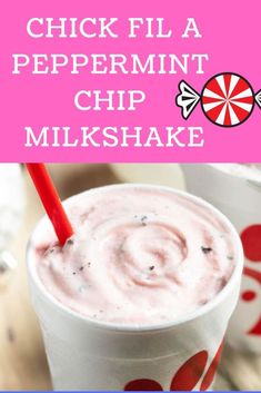 a close up of a drink in a cup with the words chick fila peppermint chip milkshake