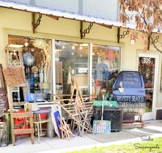 a store front with lots of chairs and other items