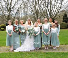 a group of women standing next to each other