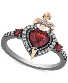 Evil gets an elegant makeover in this dramatic garnet and diamond heart and sword ring, inspired Evil Queen from Enchanted Disney Fine Jewelry. Queen Rings, Enchanted Disney, Enchanted Disney Fine Jewelry, Disney Fine Jewelry, Queen Jewelry, Magical Jewelry, Disney Jewelry, Evil Queen, Pretty Rings