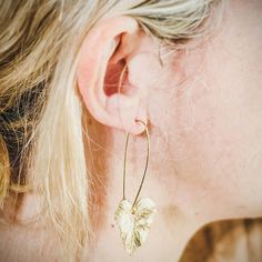 Crafted with a charming heart-shaped ivy leaf design, these elegant earrings feature long modern wires. Perfect for any nature lover who loves a unique but simple design. ⬩19mm x 10mm Leaf shape ⬩Long Hook-style Hypoallergenic wire⬩3-inch Dangle earring This item is Handmade Ivy Leaf, Mala Bracelet, Metal Earrings, Brass Earrings, Metal Necklaces, Metal Bracelets, Gemstone Bracelets, Chain Link Necklace, Elegant Earrings