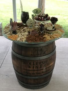 a wooden barrel filled with lots of food