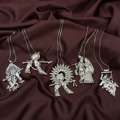 Radha Krishna Oxidized Chain Pendant Set of 5 pc, Janmashtami Jewelry, Ladoo Gopal Indian Ethnic Krishna Flute Feather Iskcon Necklace Add charm and charisma to your beautiful personality with this stylish and trendy SET for girls or women. Made up of high-quality stuff, it is an IDEAL GIFT for any occasion for your loved ones; it will surely make a memorable impression. Perfect gift for girls, women, girlfriend. You can pair it with any casual, semi-formal, or informal attire, and gather compli Radha Krishna Locket Gold, Necklaces With Motifs For Navratri Gift, Silver Necklaces With Motifs For Festivals, Navratri Gift Necklaces With Motifs, Navratri Necklaces With Motifs As Gift, Devi Aesthetic, Krishna Accessories, Flute Necklace, Informal Attire