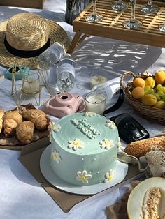 a table topped with lots of different types of cakes and desserts on top of it