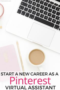 a laptop computer sitting on top of a white desk next to a cup of coffee