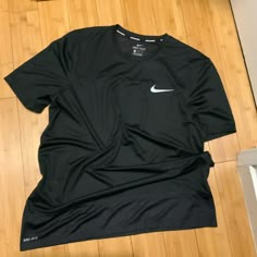 Nwot Men’s Xl Running Shirt Casual Black Shirt For Sports, Black Casual Moisture-wicking Shirt, Black Moisture-wicking Short Sleeve Shirt, Nike Crew Neck Moisture-wicking Shirt, Nike Crew Neck Shirt With Moisture-wicking, Nike Moisture-wicking Crew Neck Shirt, Nike Short Sleeve Shirt With Moisture-wicking, Nike Black Shirt For Streetwear, Nike T Shirts Mens