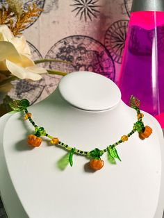 "Pumpkin Patch" 🎃🍃 This one of a kind necklace embodies an adorable pumpkin patch!  Mixed beads & stainless steel create a cute cozy vibe This necklace is a part of the Jewelry by Jess Fall Launch this necklace is 15 in in length Vine Necklace, Pumpkin Necklace, Jewelry Halloween, Fall Jewelry, Holiday Deals, Handmade Necklace, Necklace Handmade, Pumpkin Patch, Necklace Jewelry