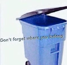 a blue plastic trash can with a metal lid and an inscription that reads, don't forget where you belong