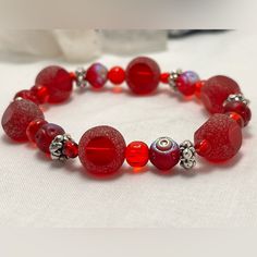 Brand New Handmade Red Stretch Bracelet With Frosted Beads And Chrome Beads And Silver Accents Red Bohemian Beaded Bracelets, Octopus Bracelet, Pride Bracelet, Wood Bead Bracelet, The Crown Jewels, Snake Chain Bracelets, Freshwater Pearl Bracelet, Gold Bracelet Cuff, Elephant Charm