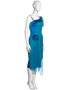 For Sale on 1stDibs - ▪ Issey Miyake blue silk mesh ▪ Draped mesh overlay ▪ Floral corsages ▪ Asymmetric neck and hemline ▪ Size JP 2 - Medium ▪ Spring-Summer 2005 ▪ 100% Silk Elegant Blue Mesh Dress For Summer, Elegant Blue Mesh Summer Dress, Elegant Blue Mesh Dress For Spring, Elegant Blue Mesh Dress For Party, Blue Sheer Silk Dress, Blue Sleeveless Silk Chiffon Dress, Sheer Blue Evening Dress, Fitted Blue Sheer Evening Dress, Blue Asymmetrical Silk Dress