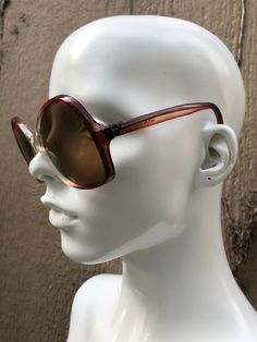 1960-1970's Vintage sunglasses, clear & red ombré acetate frames with deep red/subtle purple arms, brown tinted (high quality) lenses, round shape, oversized fit, made in Greece. Condition is new old stock, but there are signs of age & wear from storage; may need adjustments, wear to finish & residue from adhesive, light scratches. *For 20% off your purchase of 3 or more accessories, clothing items, glasses & shoes, please enter the discount code WARDROBE20 at checkout. Vintage Red Sunglasses With Mirrored Lenses, Retro Red Sunglasses With Gradient Lenses, Red Retro Sunglasses With Gradient Lenses, Vintage Red Sunglasses For Party, Jackie O Sunglasses, Butterfly Boho, Clubmaster Sunglasses, Red Sunglasses, Red Ombre