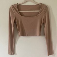 Worn Once Cream-Ish Tan Cute Cropped Long Sleeve Crop Top Very Comfortable Fabric Cheap Beige Crop Top For Summer, Cheap Brown Crew Neck Tank Top, Cheap Beige Summer Crop Top, Trendy Cheap Solid Color Crop Top, Cheap Brown Tops For Playwear, Affordable Brown Ruched Tops, Cheap Brown Ruched Tops, Basic Long Sleeve Beige Tops, Brown Crop Top Outfit