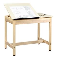 a wooden desk with a white board on top