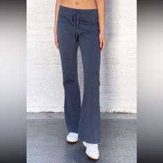 Soft Cotton Blend Tie Yoga Pants With A Big Flare Pant Leg. Fabrics: 100% Cotton Measurement: 10" (30 Cm) Rise, 34" (81 Cm) Inseam, 15" (66 Cm) Waist (Stretches) Made In: Italy Denim Blue Pants With Elastic Waistband For Loungewear, Casual Gray Bottoms For Yoga, Denim Blue Cotton Bottoms For Loungewear, Denim Blue Cotton Pants For Loungewear, High Rise Cotton Lounge Pants, High Rise Cotton Loungewear Pants, High Rise Cotton Pants For Loungewear, Blue Cotton Yoga Pants For Loungewear, Casual Blue Cotton Yoga Pants