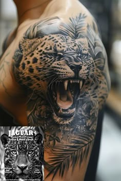 a man with a tattoo on his arm and chest has an angry leopard design on it