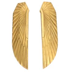 pair of gold - plated earrings with fan shapes