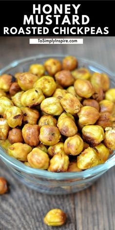 honey mustard roasted chickpeas in a glass bowl on a wooden table with text overlay