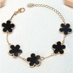 Brand New. Adjustable And Fits Most Sizes. Black Casual Jewelry For Spring, Casual Black Jewelry For Spring, Spring Gift: Black Jewelry, Chic Black Flower Jewelry, Trendy Black Flower-shaped Jewelry, Elegant Black Spring Jewelry, Clover Bracelet, Womens Jewelry Bracelets, Gold Plate