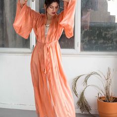 This Kimono is carefully handcrafted from 100% silk mousseline with the smoothest touch. It is cut in a relaxed shape emphasized by wide Japanese sleeves. Wear it as a beach coverup, lounging gown or style it with a mini dress, gold accessories and sandals for a special occasion or a night out. 100% SilkDry Clean Only Japanese Sleeves, Red Studio, Coral Roses, Japanese Sleeve, Roses Are Red, Dress Gold, Silk Kimono, Gold Accessories, Independent Designers Fashion