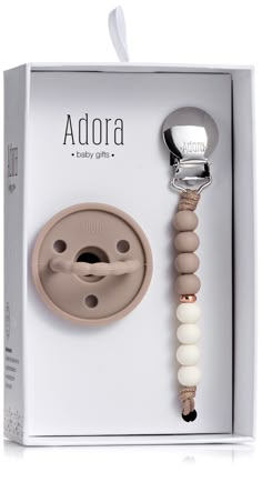 a baby pacifier in a gift box