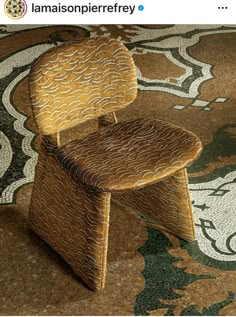 a chair sitting on top of a carpet covered floor