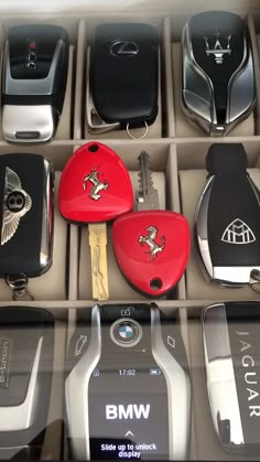 several different types of car keys in a box