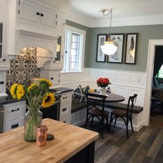 the kitchen is clean and ready to be used as a dining room or breakfast nook