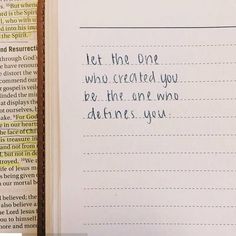 an open book with writing on it next to a pen and paper clipping that says let the one who created you be, there are two who address you