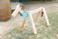 a wooden frame with a rope attached to it