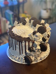 an oreo cookies and cream cake on a table