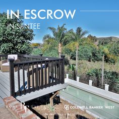 the cover of inescrow magazine features an image of a deck and trees