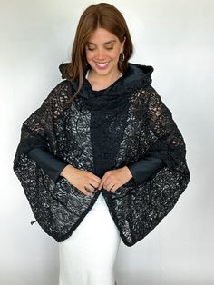 Description: Introducing the Sophie Wrap, crafted with a beautiful black lace fabric. This fabric offers exceptional flow and breathability, making it perfect for hotter climates. Unique and stylish, it is ideal for layering and adding a touch of elegance to any outfit. Features: Beautiful Black Lace Fabric: Elegant and breathable with exceptional flow. Comfort in Hotter Climates: Lightweight and airy for all-day comfort. Versatile Styling: Perfect for layering over dresses, pairing with shorts, Black Lace Top For Fall, Elegant Outerwear With Lace Sleeves, Fall Lace Top For Layering, Elegant Black Lace Top For Layering, Crochet Lace Top For Fall, Black Lace Top For Layering, Chic Lace Outerwear For Party, Elegant Lace Outerwear With Lace Sleeves, Black Lace Party Outerwear