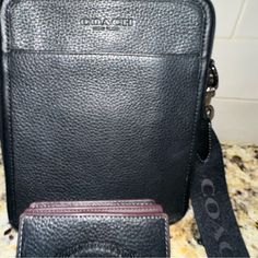 Black Leather Coach Crossbody Purse With Coach Lettered Strap And A Coach Leather Wallet. Purse And Wallet Come As A Set For $250. Virtually Brand New. I Bought In Vegas In March As I Needed Something To Be On My Body To Protect Money. Once I Got Home I No Longer Used It. I Am Used To Big Bags. I Will Ship The Same Day Purchased. Luxury Black Wallets For Daily Use, Luxury Wallet With Removable Pouch Crossbody, Designer Crossbody Wallets For Daily Use, Designer Wallet For Everyday Use, Designer Wallet With Removable Pouch For Travel, Designer Travel Bifold Bag, Designer Travel Crossbody Wallets, Designer Travel Wallets In Pouch Shape, Designer Travel Wallet Pouch