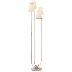 three light floor lamp with two lamps on each side and one is turned off to the side