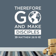 there is a wall sticker with the words go and make disciples