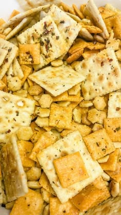 a bowl filled with crackers and cheese